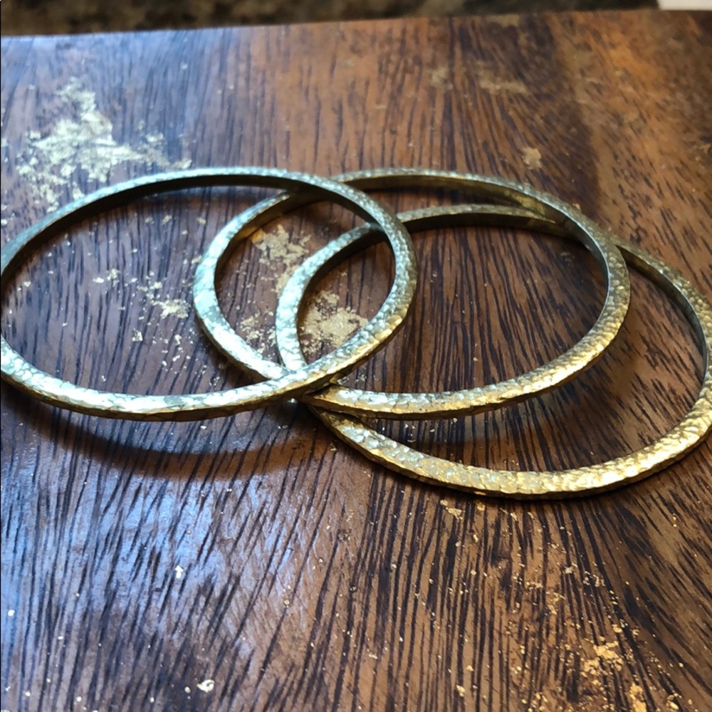 Set of three stacking hammered brass bangles